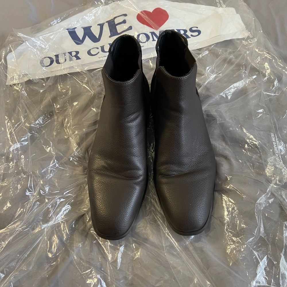 Men's  brown leather dress boots.